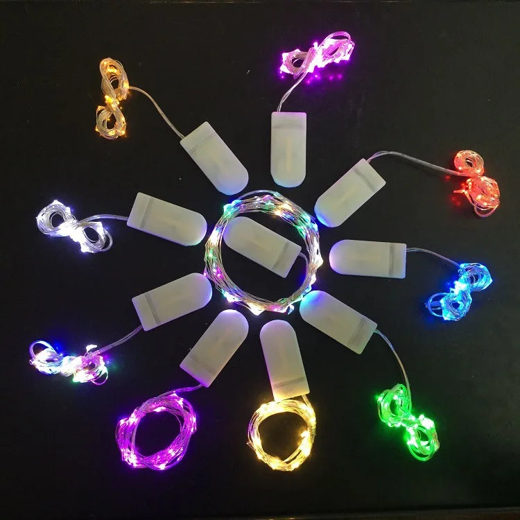 Batteria funkciigita CR2032 Twinkle Mini LED-oj de kupro argento fadeno 10 LED ĉeno fajra lumo festa iluminado por dekoraciaĵo.