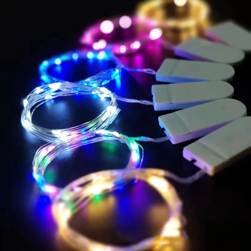 Batteria funkciigita CR2032 Twinkle Mini LED-oj de kupro argento fadeno 10 LED ĉeno fajra lumo festa iluminado por dekoraciaĵo.